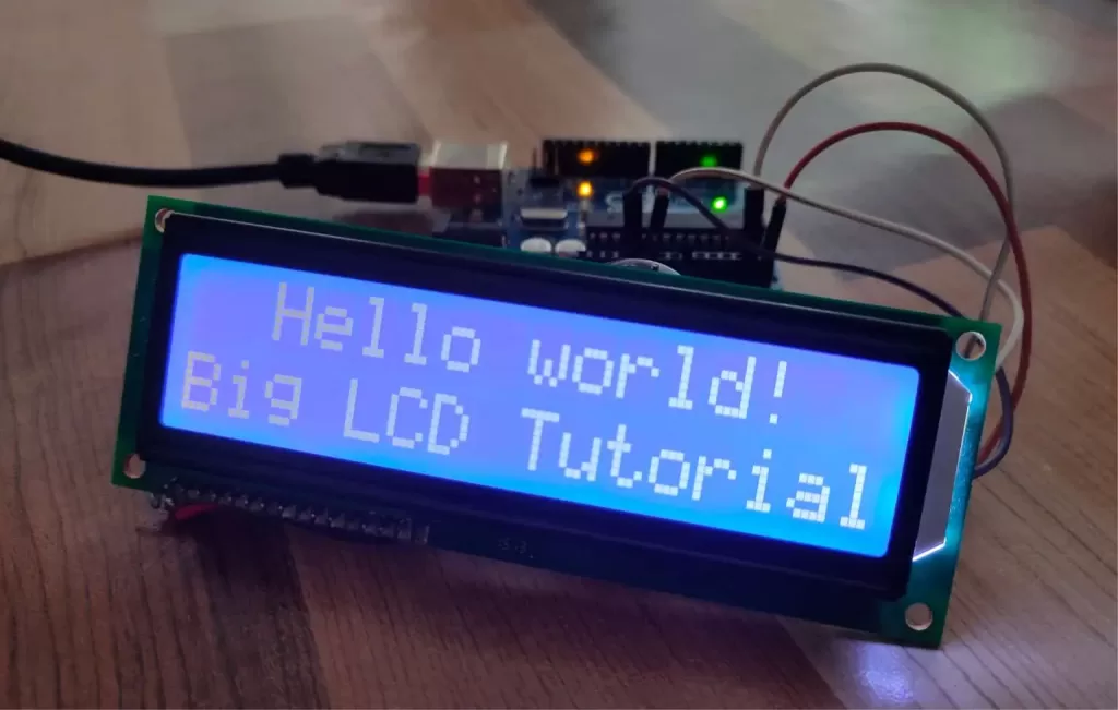 Hello world written on jumbo LCD display jhd162G