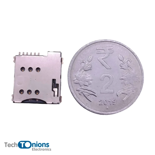Micro SIM Card Socket – 6 pins – Spring Loaded Push type for scale with 2 rupees coin from top view